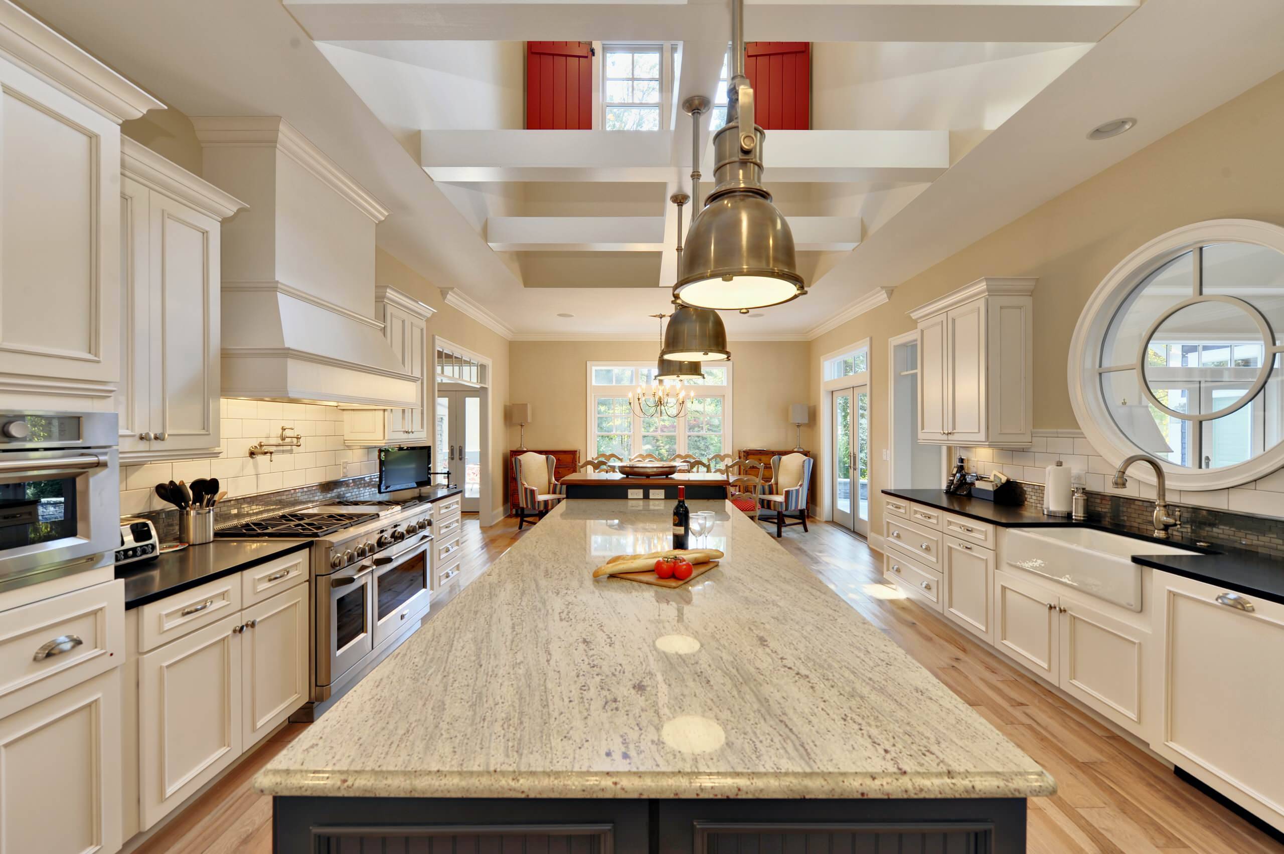 Polished granite countertop with natural stone patterns installed in a kitchen