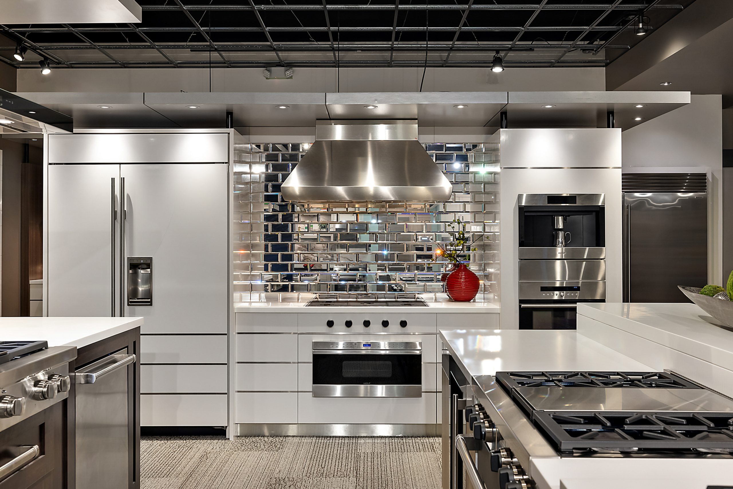 High-end kitchen appliances on display in a showroom for selection and planning