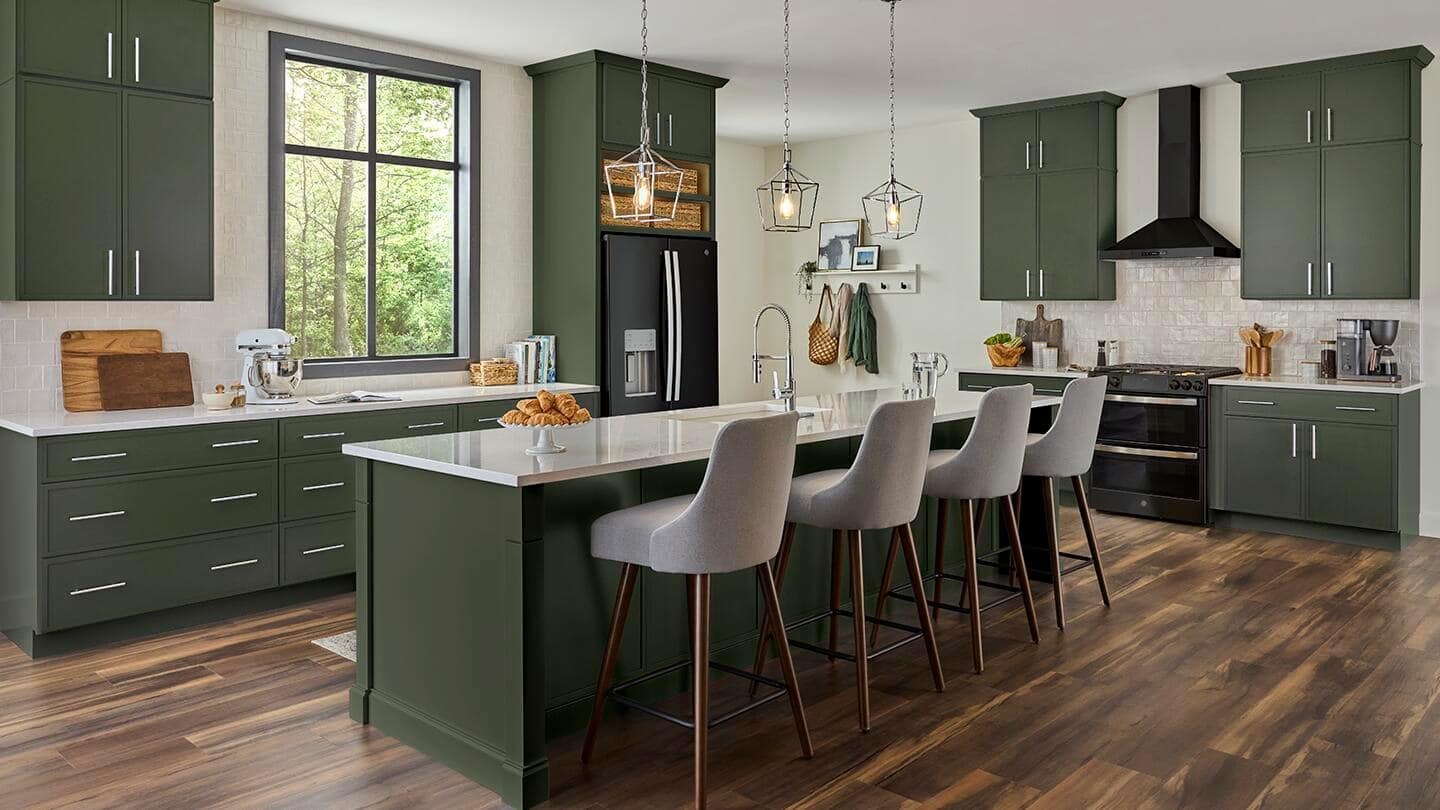 Clean refreshed kitchen makeover with updated paint, hardware, and countertops on a budget