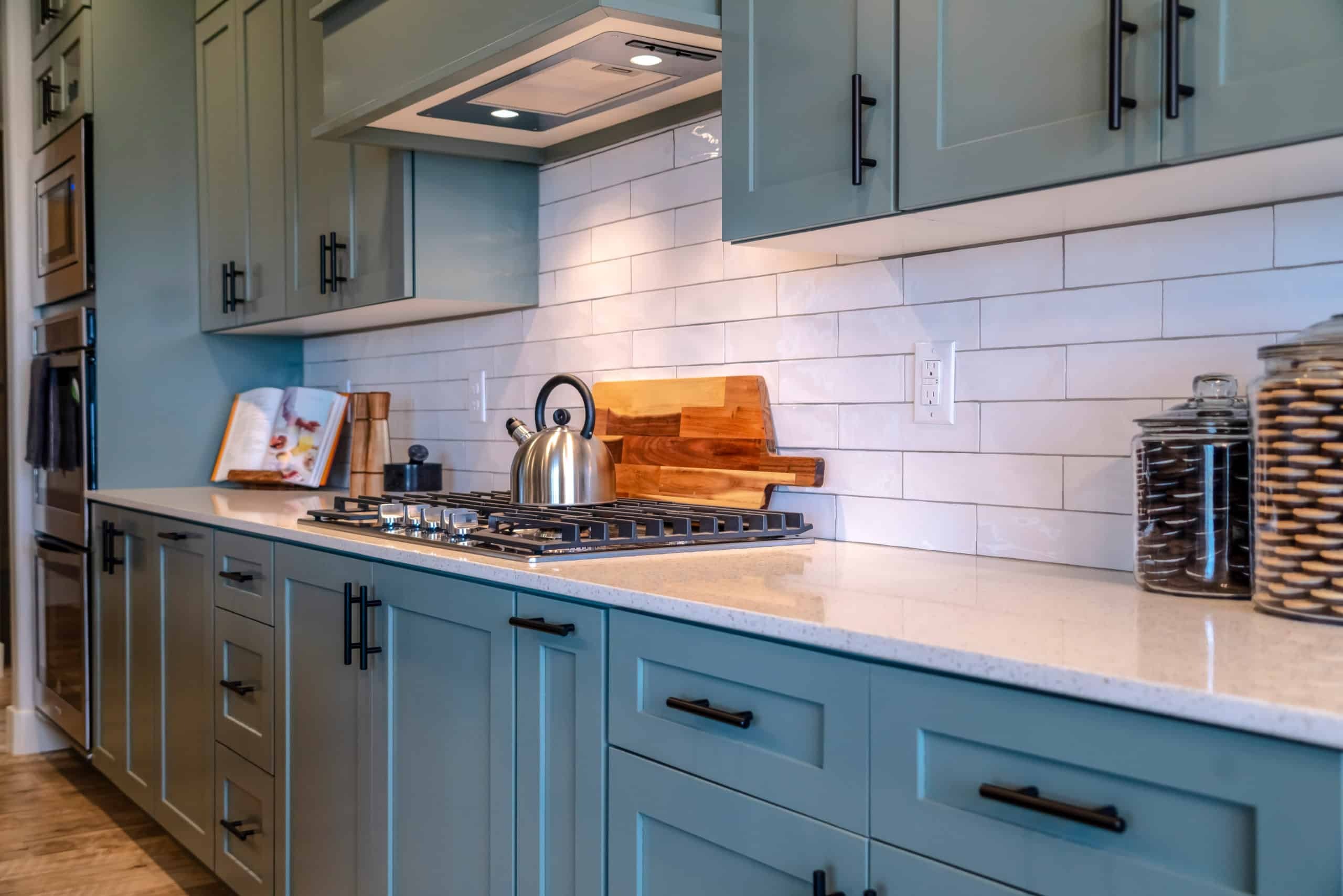 Professionally painted kitchen cabinets in a smooth modern finish