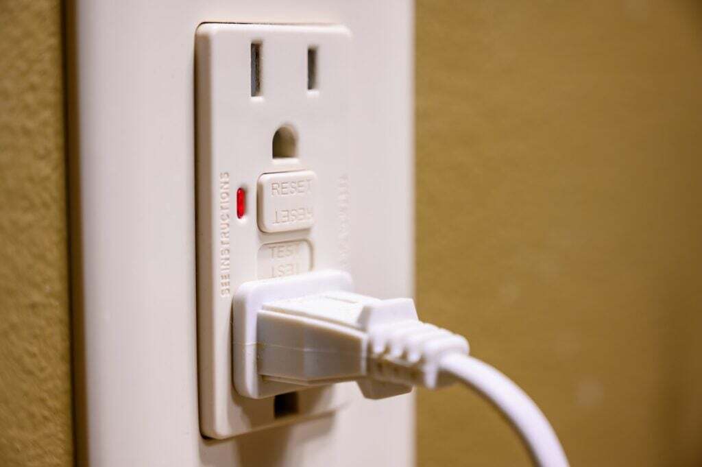 GFCI electrical outlet installed in a kitchen for safe appliance connection