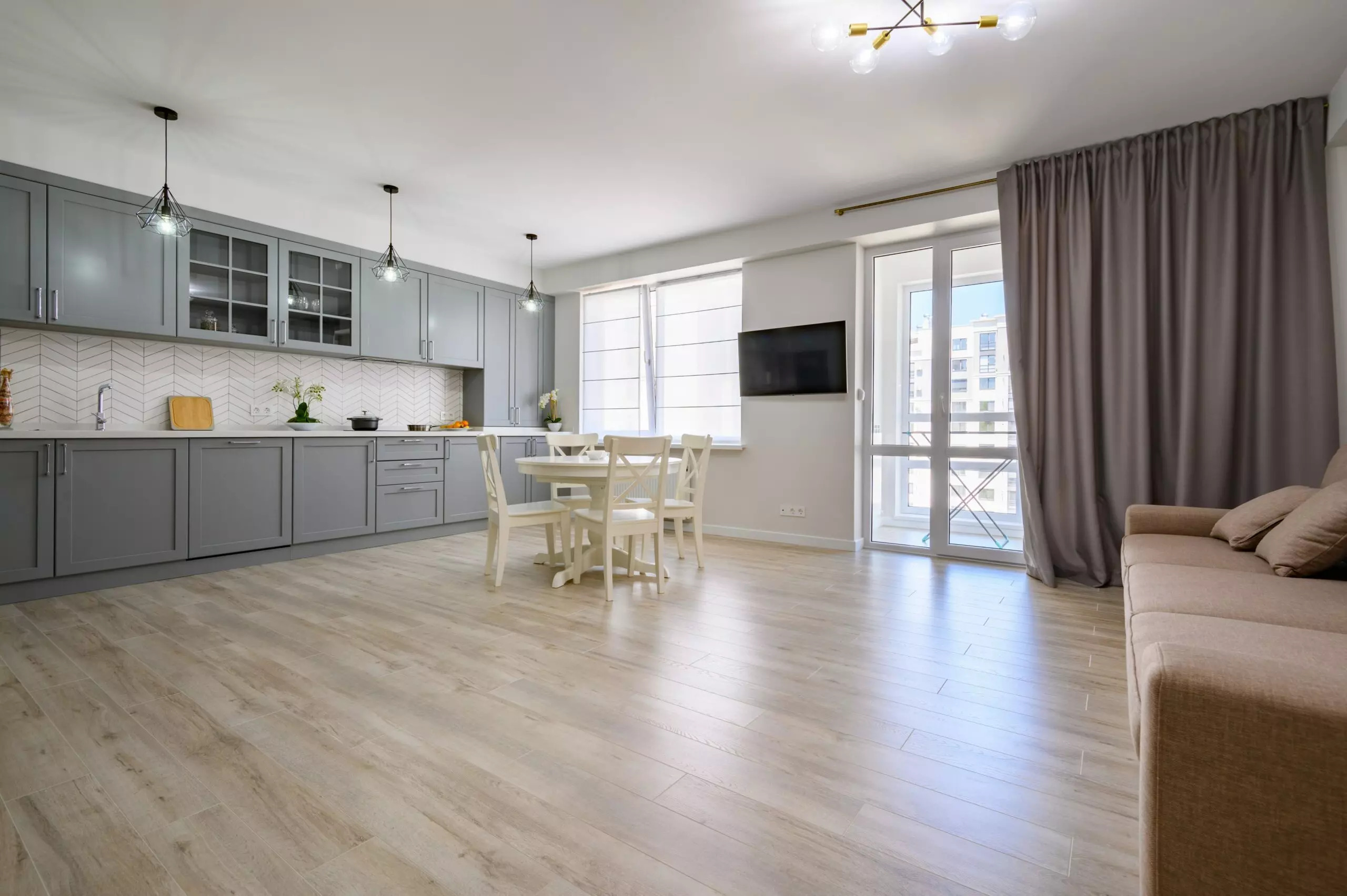 Luxury vinyl plank flooring with realistic wood-look finish installed in a kitchen