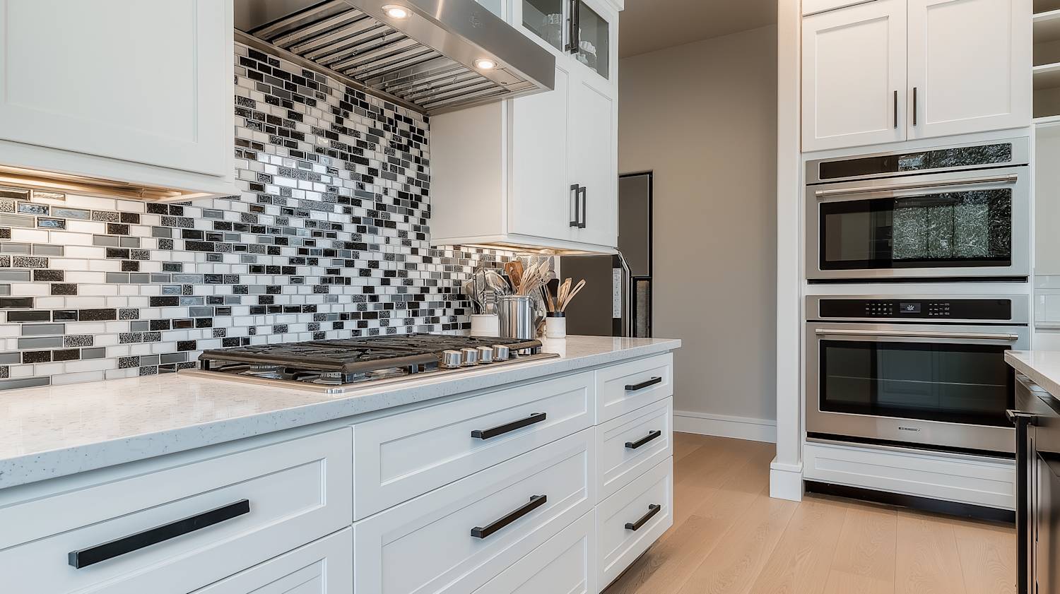 Decorative mosaic tile backsplash with intricate pattern creating a kitchen focal point