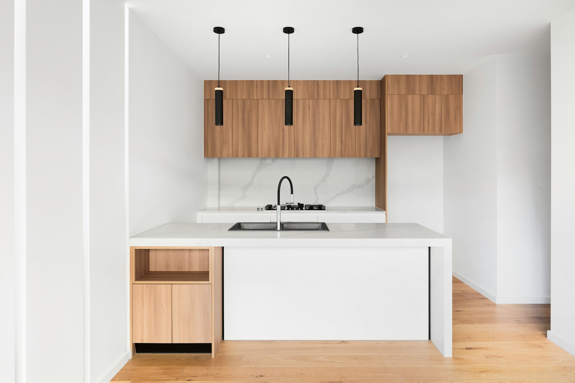 Well-organized compact kitchen showcasing efficient use of space with smart storage solutions