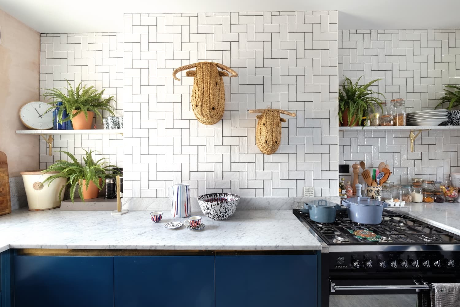 Classic white subway tile backsplash installed behind a kitchen countertop